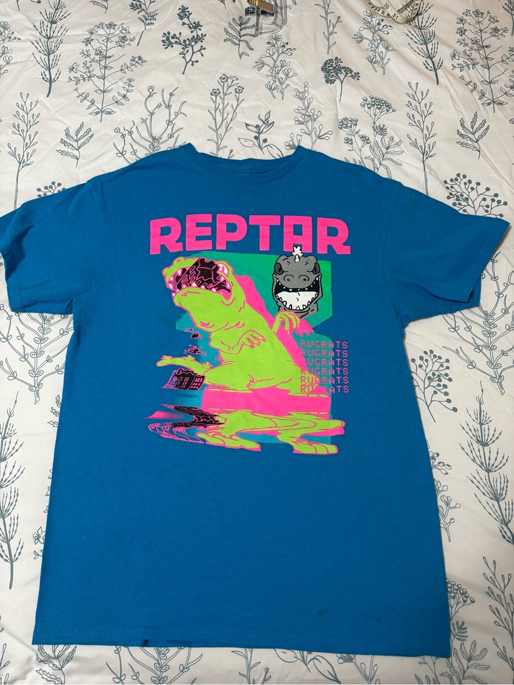Nickelodeon Blue T-Shirt with Neon Green and Hot Pink Reptile Graphic